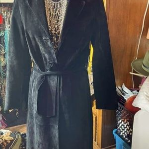 Full length black 100% leather full length coat. In good condition.